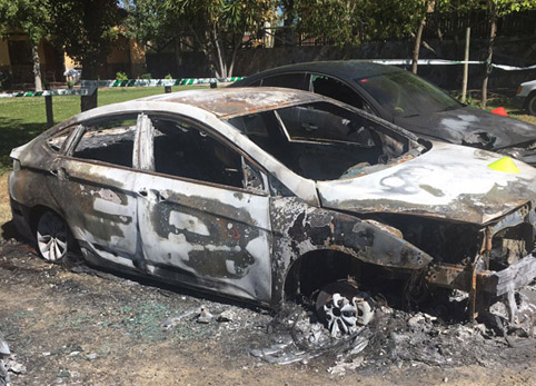 Archivada la causa contra dos taxistas por el incendio de VTCs en Sevilla